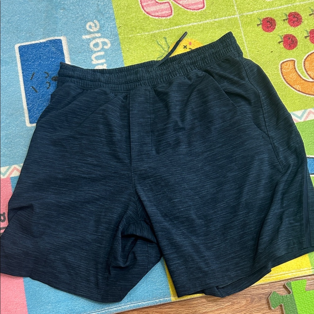 Lululemon blue pace breaker shorts. Small 7”